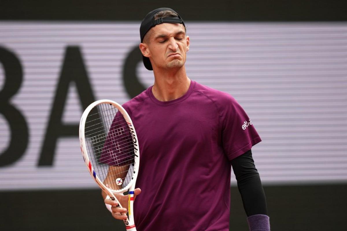 France's Terence Atmane reacts during his men's singles match against France's Richard Gasquet on day 2 of the French Open tennis tournament on Court Philippe-Chatrier at the Roland-Garros Complex in Paris on May 26, 2025. Dimitar DILKOFF / AFP