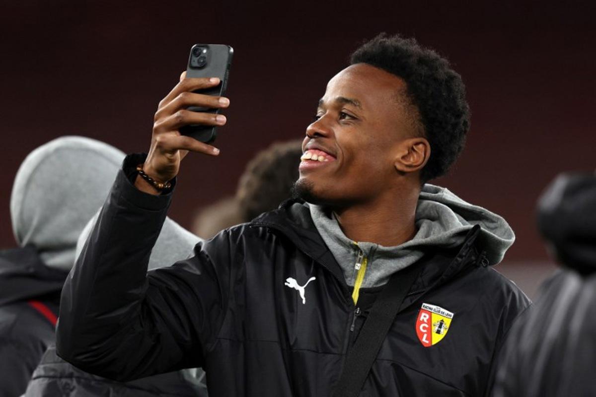 Lens' Madagascar goalkeeper #40 Yannick Pandor attends a walkaround of the pitch at Arsenal Stadium in London, on November 28, 2023, on the eve of their UEFA Champions League Group B football match against Arsenal. Adrian DENNIS / AFP