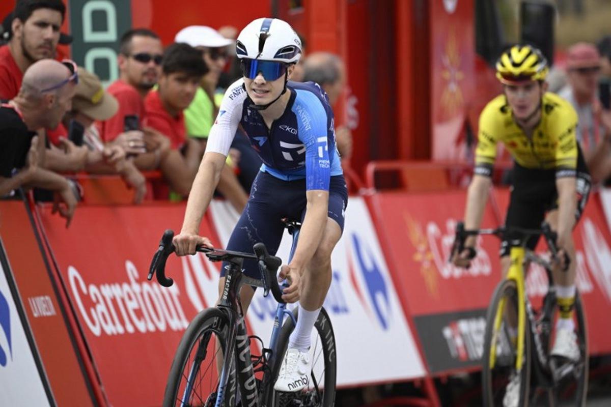 Team Israel Premier Tech's US rider Matthew Riccitello crosses the finish line during the 14th stage of the Vuelta a Espana cycling tour, a 135 km race between Aviles and La Farrapona in Somiedo, on September 6, 2025. Cycling team Israel-Premier Tech removed their name from their kit at the Vuelta a Espana today after pro-Palestine protests aimed at them during the race. Miguel RIOPA / AFP