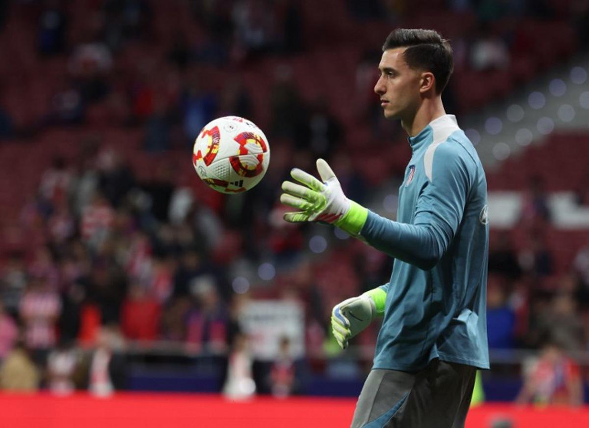 Atletico Madrid's Argentine goalkeeper #01 Juan Musso warms up before the Spanish Copa del Rey (King's Cup) semi-final second leg football match between Club Atletico de Madrid and FC Barcelona at Metropolitano Stadium in Madrid on April 2, 2025. Pierre-Philippe MARCOU / AFP