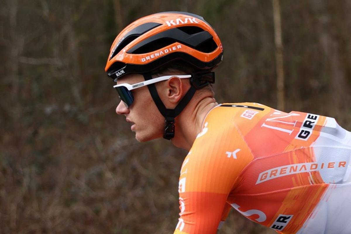 INEOS Grenadiers' British rider Oscar Onley rides with the pack during the 2nd stage of the Paris-Nice cycling race, 187 km between Épône and Montargis, on March 9, 2026. Anne-Christine POUJOULAT / AFP