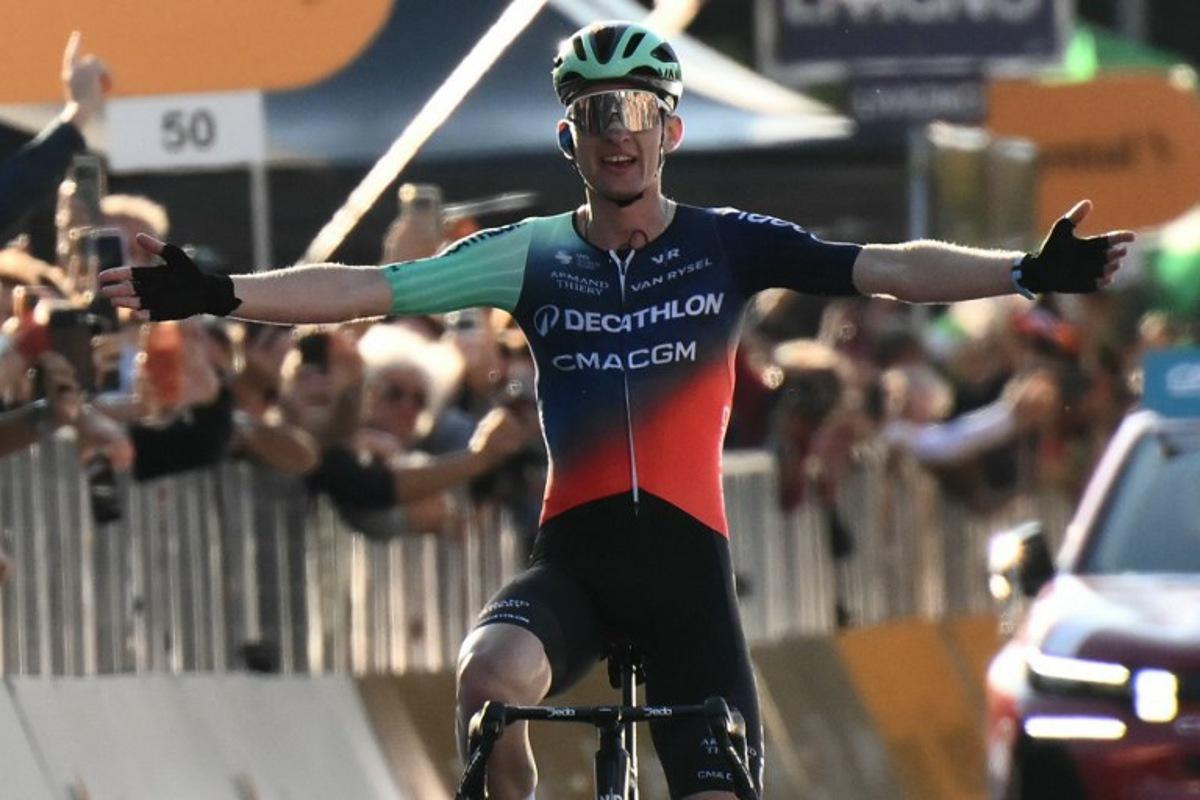 Decathlon CMA CGM Team's French rider Paul Seixas celebrates after winning the 120th edition of the Giro di Lombardia (Tour of Lombardy) between Bergamo and Como on October 10, 2026. Marco BERTORELLO / AFP