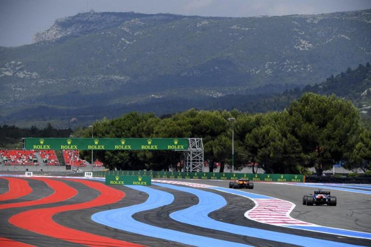 McLaren's British driver Lando Norris drives ahead of Alpine's French driver Esteban Ocon (R) during the first practice session at the Circuit Paul-Ricard in Le Castellet, southern France, on June 18, 2021, two days ahead of the French Formula One Grand Prix. NICOLAS TUCAT / AFP