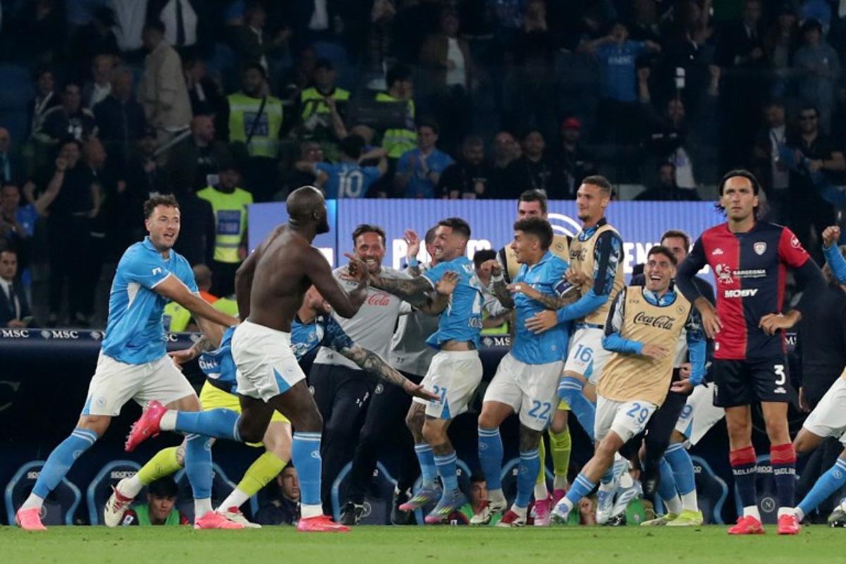 Napoli's Belgian forward #11 Romelu Lukaku (2-L) celebrates with his teammates after scoring his team's second goal during the Italian Serie A football match between Napoli and Cagliari at the Diego Armando Maradona stadium in Naples on May 23, 2025. Carlo Hermann / AFP