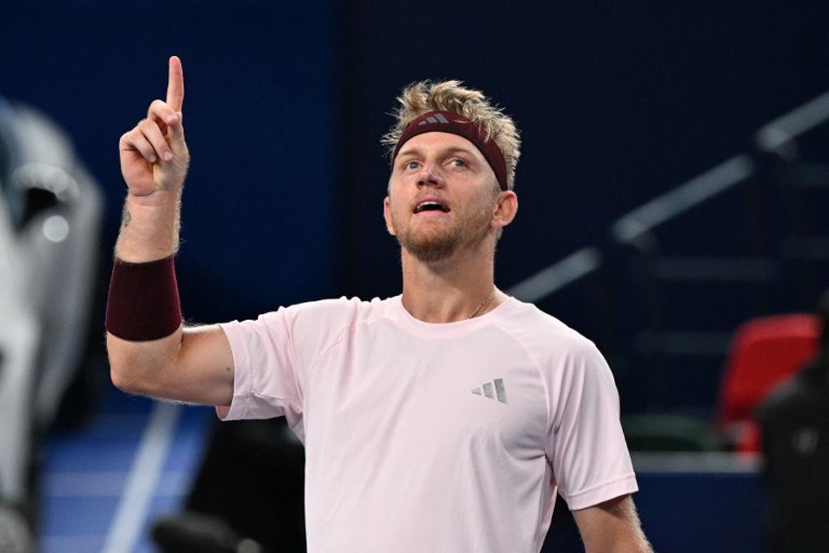 Spain's Alejandro Davidovich Fokina celebrates his victory against Germany's Alexander Zverev during their men's singles semi-final match at the Shanghai Masters tennis tournament in Shanghai on October 17, 2026. Hector RETAMAL / AFP