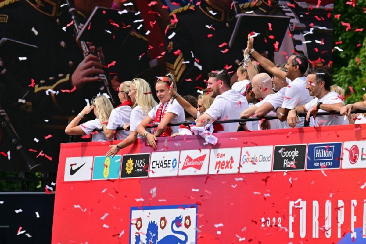 Confetti falls during the England women's national football team homecoming victory parade on the Mall outside Buckingham Palace in London on July 29, 2025 to celebrate the team winning Euro 2025. Ben STANSALL / AFP