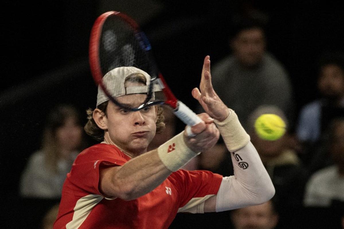 Belgian Zizou Bergs returns the ball to France's Ugo Humbert during their semi-final simple tennis match at the Marseille Open 13 ATP World Tour in Marseille, southern France on February 15, 2025. MIGUEL MEDINA / AFP