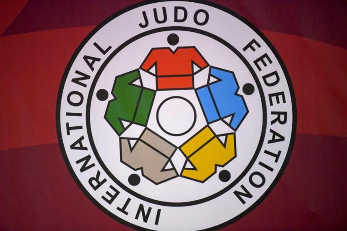 The logo of the International Judo Federation is displayed during the Abu Dhabi Grand Slam in the Emirati capital on October 25, 2019. KARIM SAHIB / AFP