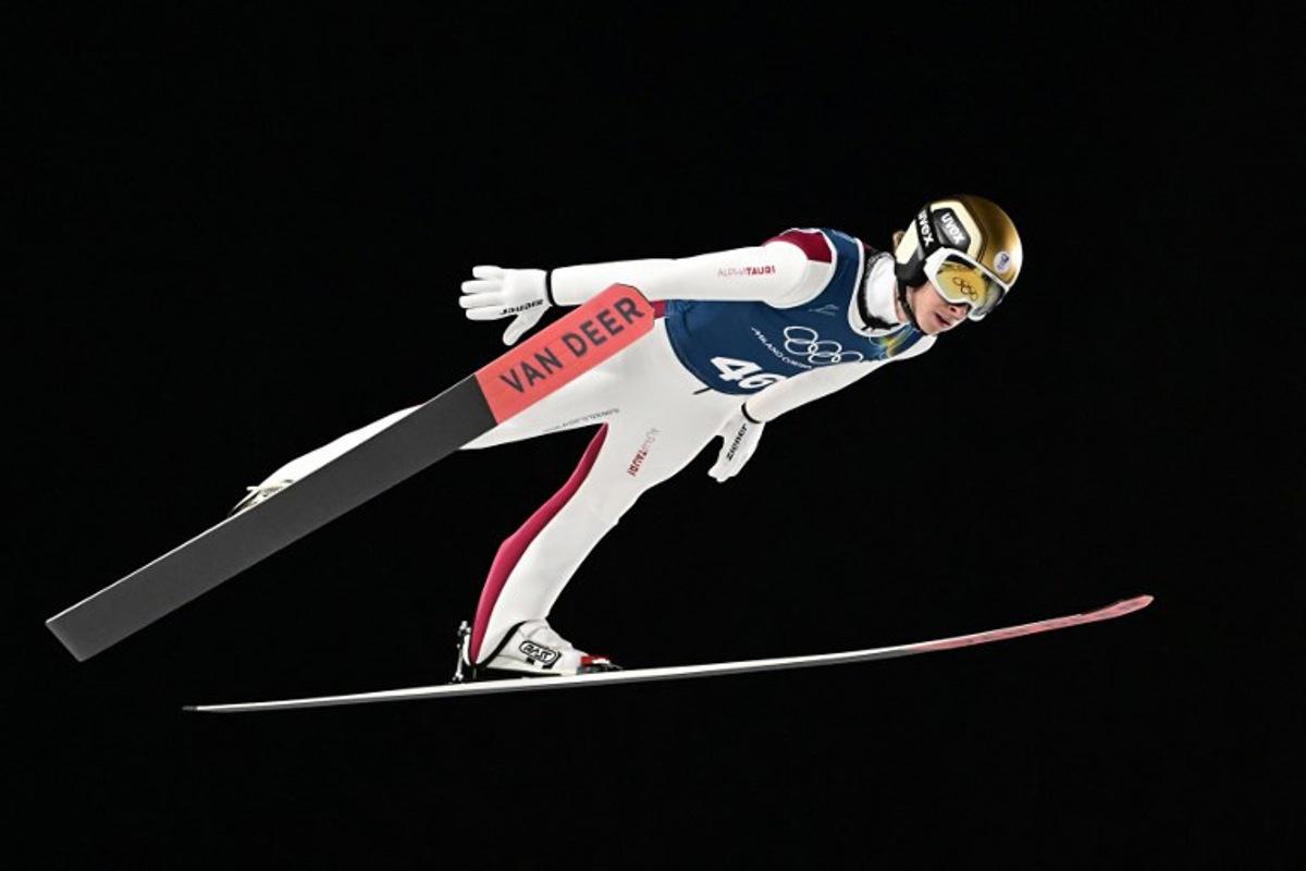 Austria's Daniel Tschofenig jumps during the training for the men's large hill ski jumping of the Milano Cortina 2026 Winter Olympic Games at Predazzo Ski Jumping Stadium in Predazzo (Val di Fiemme), on February 13, 2026. Tobias SCHWARZ / AFP