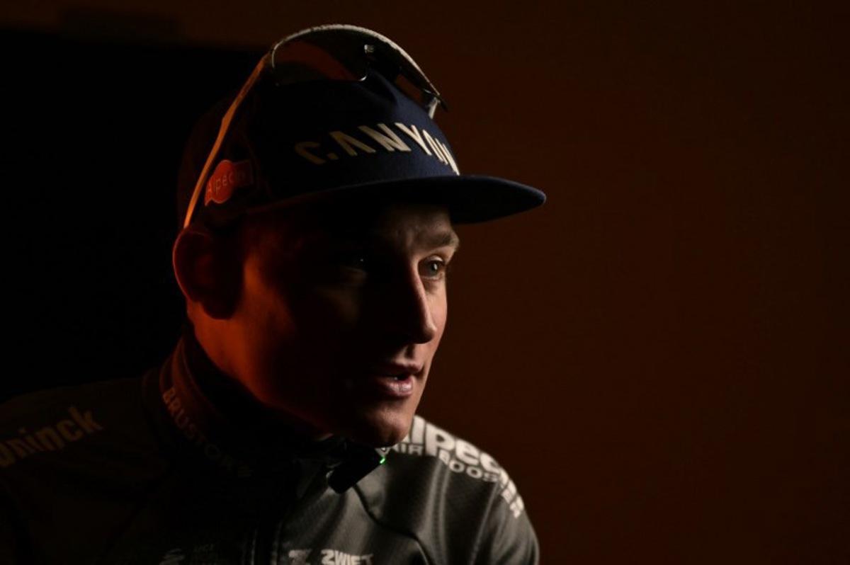 Dutch Mathieu Van Der Poel of team Alpecin-Deceuninck, winner, poses for a portrait after the podium ceremony of the Milan - Sanremo one-day classic cycling race, on March 22, 2025. Dutch Mathieu Van Der Poel of team Alpecin-Deceuninck won the race ahead of Team Ineos' Italian rider Filippo Ganna and Team UAE's Slovenian rider Tadej Pogacar, third. Marco BERTORELLO / AFP