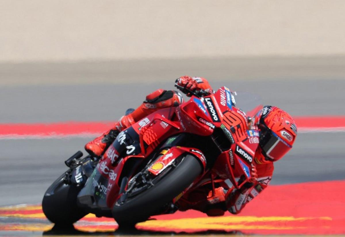 Team Ducati Lenovo Team's Marc Marquez leads the race during the MotoGP Aragon Grand Prix at the Motorland circuit in Alcaniz, northeastern Spain, on June 8, 2025. LLUIS GENE / AFP
