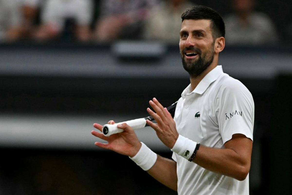 Serbia's Novak Djokovic reacts against Canada's Felix Auger-Aliassime during their men's singles quarter-final tennis match on the ninth day of the 2026 Wimbledon Championships at The All England Lawn Tennis and Croquet Club in Wimbledon, southwest London, on July 7, 2026. Glyn KIRK / AFP