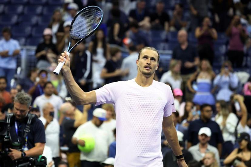 Germany's Alexander Zverev waves his racquet to the crowd after defeating Chile's Alejandro Tabilo during their men's singles third-round tennis match on day seven of the US Open tennis tournament at the USTA Billie Jean King National Tennis Center in New York City in the early hours of September 6, 2026. Leonardo MUNOZ / AFP