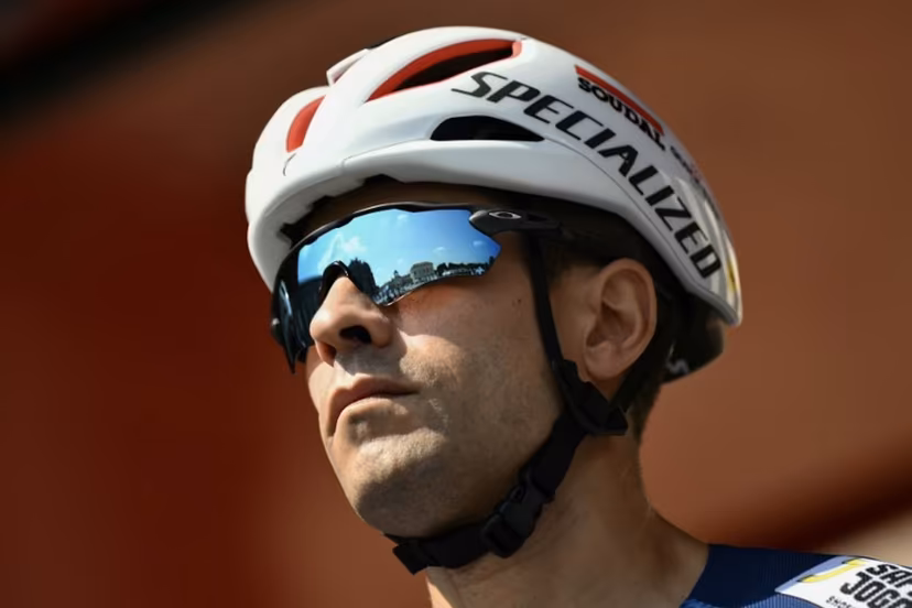 Soudal Quick-Step's Spanish rider Mikel Landa is presented on stage before the start of the Vuelta a Espana, a 183 km race between Torino - Reggia di Venaria and Novara, in Italy's Piemonte region, on August 23, 2025. Marco BERTORELLO / AFP
