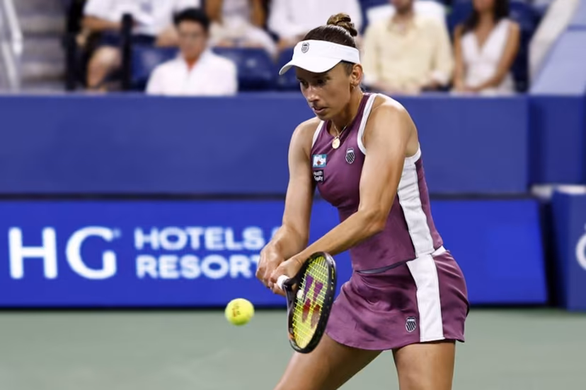 Belgium's Elise Mertens hits a return to Japan's Naomi Osaka in their women's singles third round tennis match on day seven of the US Open tennis tournament at the USTA Billie Jean King National Tennis Center in New York City on September 5, 2026. kena betancur / AFP