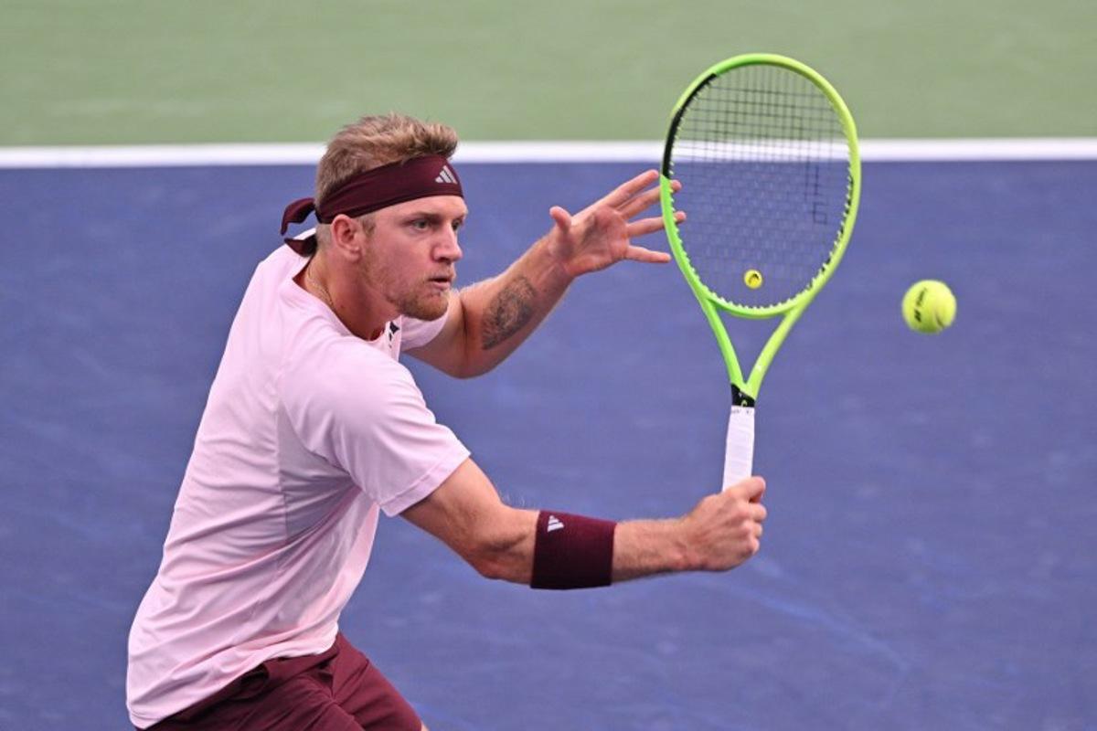 Spain's Alejandro Davidovich Fokina hits a return to Germany's Alexander Zverev during their men's singles semi-final match at the Shanghai Masters tennis tournament in Shanghai on October 17, 2026. Hector RETAMAL / AFP