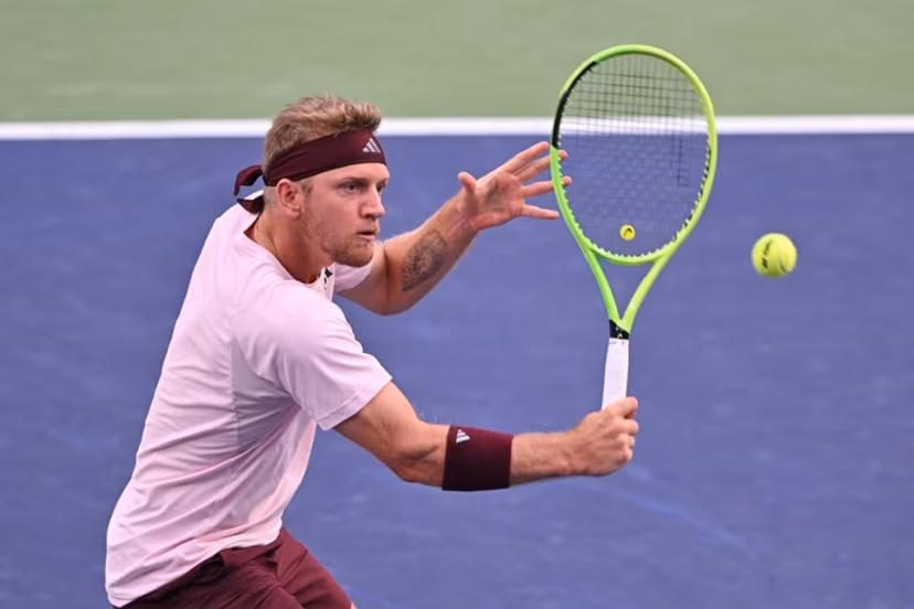 Spain's Alejandro Davidovich Fokina hits a return to Germany's Alexander Zverev during their men's singles semi-final match at the Shanghai Masters tennis tournament in Shanghai on October 17, 2026. Hector RETAMAL / AFP