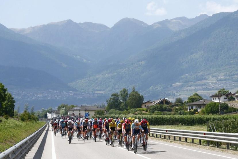 The pack rides during the 18th stage of the Giro d'Italia 2026 - Tour of Italy cycling race between Fai della Paganella and Pieve di Soligo, Italy, on May 28, 2026. Luca Bettini / AFP