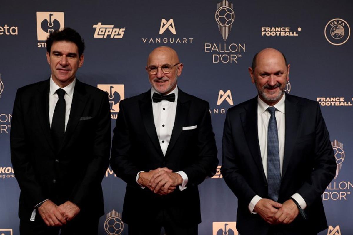 (L to R ) Spanish former footballer Aitor Karanka, Spain's Spanish manager Luis de la Fuente Castillo and Spanish football director Rafael Louzán pose upon their arrival to attend the 2026 Ballon d'Or France Football award ceremony at the Palladium Theatre in London on October 26, 2026. FRANCK FIFE / AFP