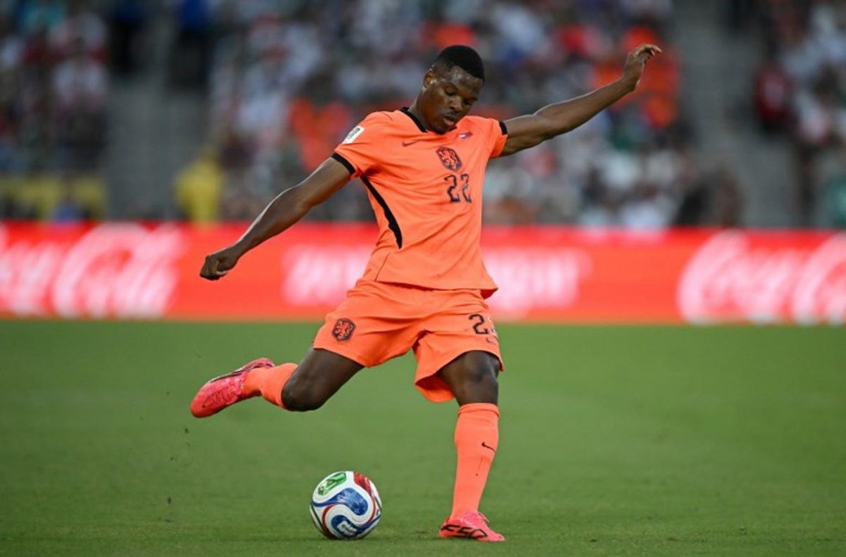 Netherlands' defender #22 Denzel Dumfries shoots during the 2026 World Cup round of 32 football match between the Netherlands and Morocco at the Monterrey Stadium in Guadalupe on June 29, 2026. CARL DE SOUZA / AFP