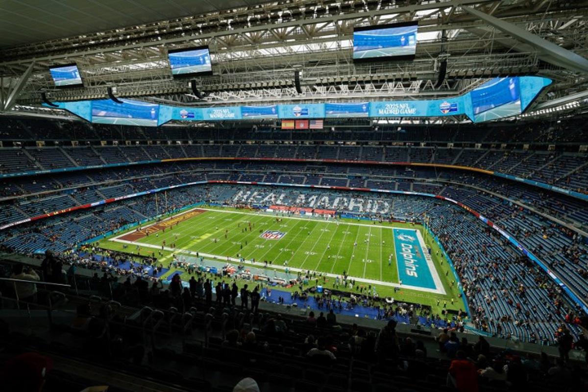 A general view shows the Santiago Bernabeu stadium before the NFL match between Miami Dolphins and Washington Commanders at Santiago Bernabeu Stadium in Madrid on November 16, 2025. Oscar DEL POZO / AFP