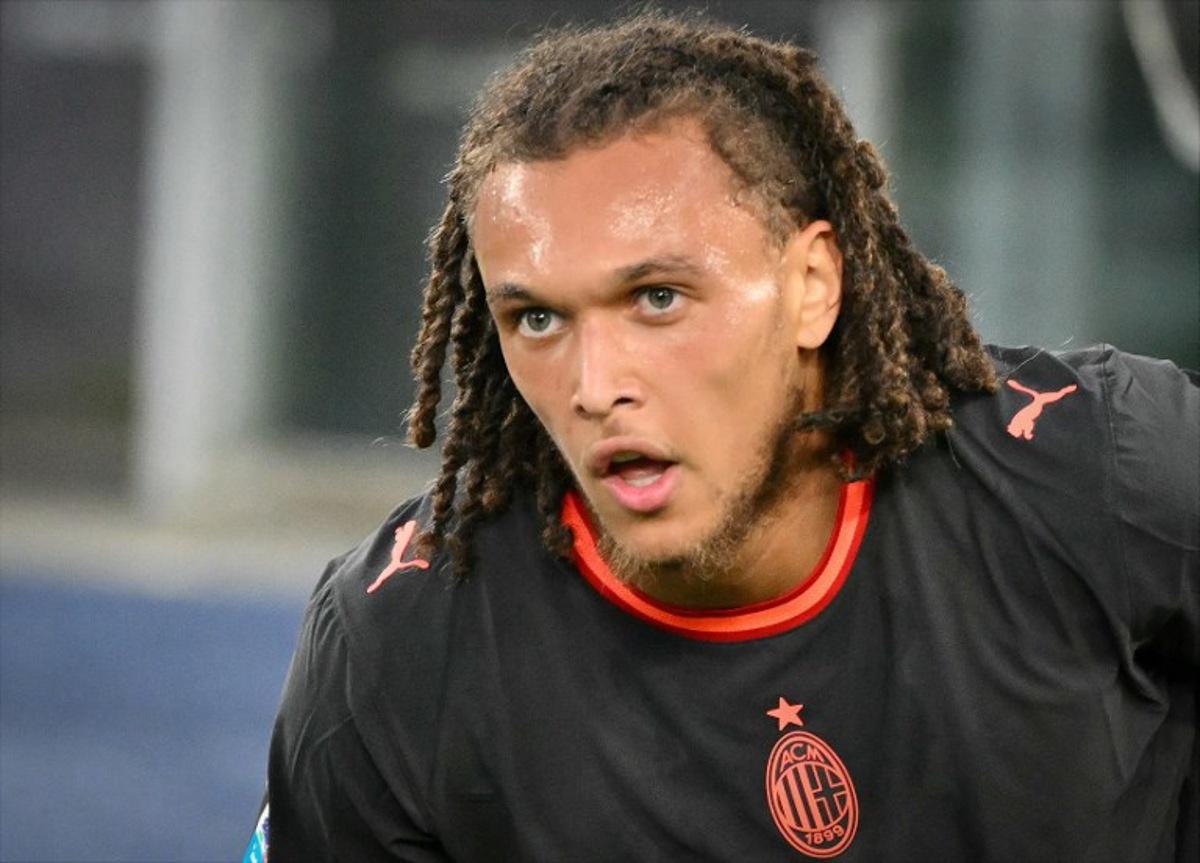 AC Milan's Belgian midfielder #22 Diego Moreira reacts after scoring Milan's second goal during the Italian Serie A football match between Lazio and AC Milan at the Olympic Stadium in Rome on September 12, 2026. Alberto PIZZOLI / AFP