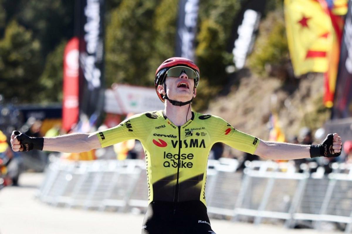 Team Visma-Lease a bike's Danish rider Jonas Vingegaard celebrates winning the fifth stage of the 2026 Volta a Catalunya cycling tour of Catalonia, a 155,5 km race between La Seu d'Urgell and La Molina ski resort in Alp, on March 27, 2026. Josep LAGO / AFP