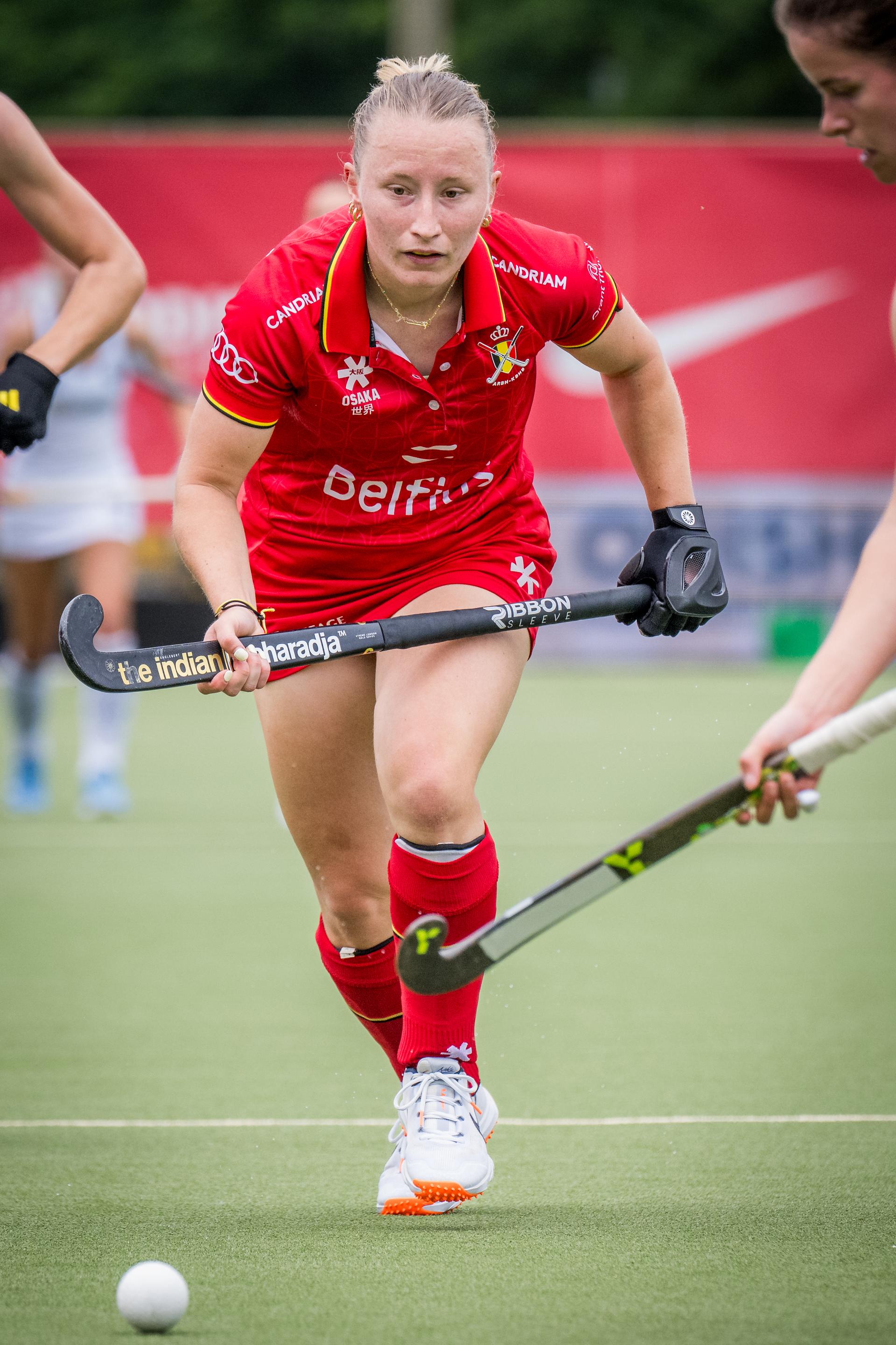 Belgium's Charlotte Englebert and German Linnea Weidemann fight for the ball during a hockey game between Belgian national team Red Panthers and Germany, match 9/16 in the group stage of the 2025 women's FIH Pro League, Saturday 14 June 2025, in Antwerp. BELGA PHOTO JASPER JACOBS