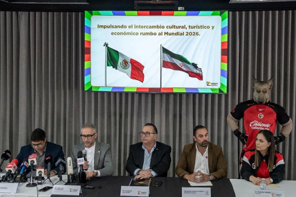 Iran's ambassador to Mexico Abolfazl Pasandideh (2nd L) attends a press conference ahead of the arrival of the national football team for the FIFA 2026 World Cup football tournament, in Tijuana, Baja California, Mexico on June 6, 2026, Iran lashed out at the United States for refusing visas to some of its squad support staff as the players were to leave Turkey for Mexico, just days before the June 11 start of the 2026 World Cup, which is being jointly hosted by the United States, Mexico and Canada. Chris Noyola / AFP