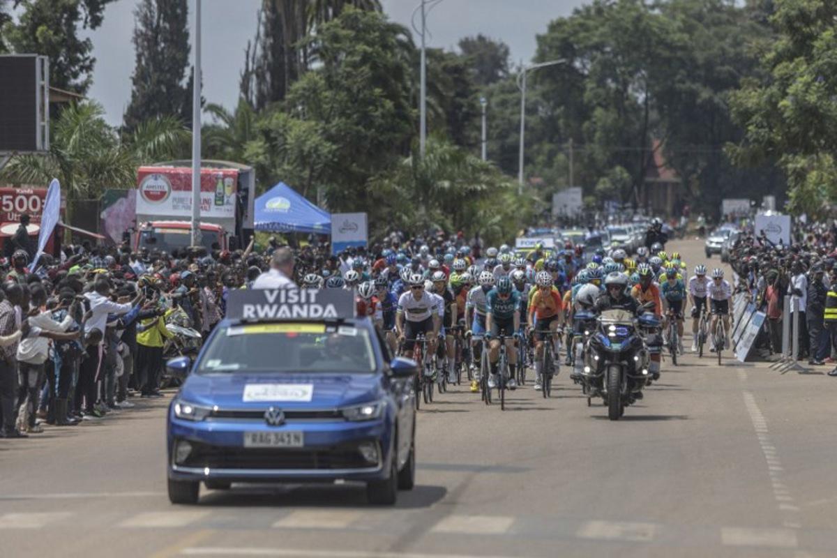 The pack rides at the start line of the third stage of the 16th Tour du Rwanda in Huye on February 20, 2024. Guillem Sartorio / AFP