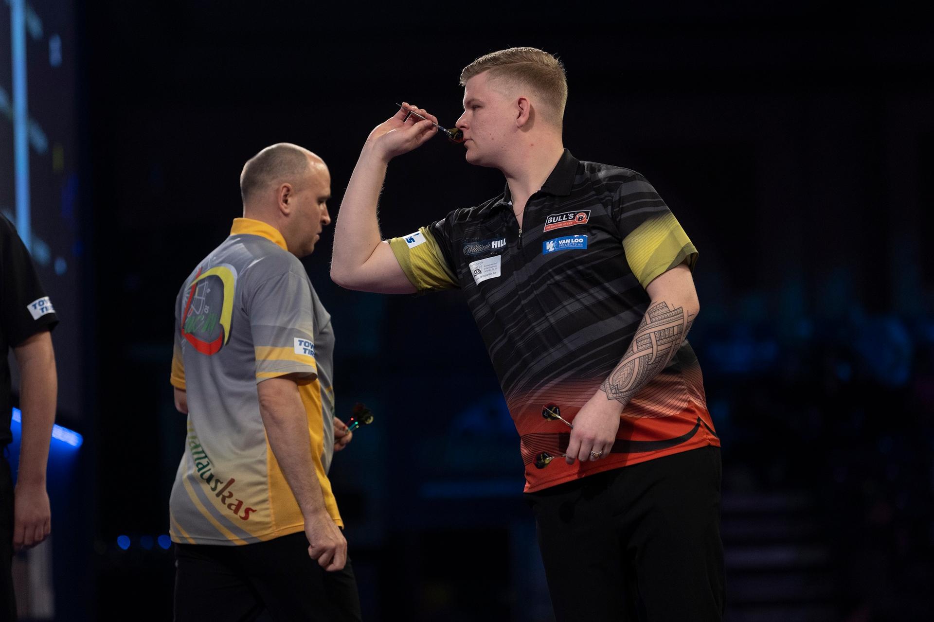 ATTENTION EDITORS - HAND OUT PICTURES - EDITORIAL USE WITH STORY ON DARTS WORLD CHAMPIONSHIPS ONLY - MANDATORY CREDIT LAWRENCE LUSTIG/PDC Hand out pictures released on Saturday 18 December 2021, by PDC Professional Darts Corporation shows Belgian Mike De Decker pictured during the game between Lithuanian Labanauskas and Belgian De Decker, in the first round of the William Hill World Championships, in London, UK. MANDATORY CREDIT KELLY DECKERS/PDC EUROPE