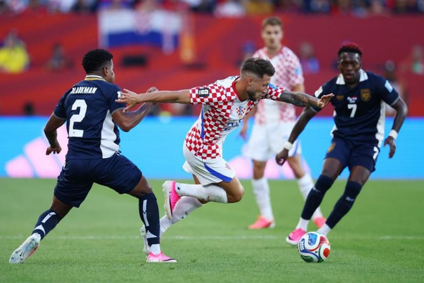 Croatia's forward #24 Marco Pasalic is fouled by Panama's defender #02 Cesar Blackman during the 2026 World Cup Group L football match between Panama and Croatia at the Toronto Stadium in Toronto on June 23, 2026. Cole Burston / AFP
