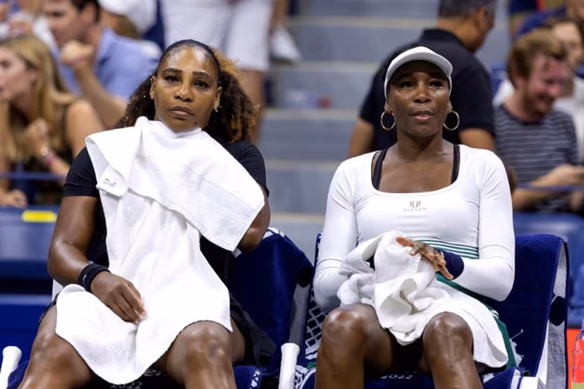 USA's Serena Williams (L) and Venus Williams sit on the bench between games as they play against Czech Republic's Lucie Hradecka and Linda Noskova during their 2022 US Open Tennis tournament women's doubles first round match at the USTA Billie Jean King National Tennis Center in New York, on September 1, 2022. COREY SIPKIN / AFP