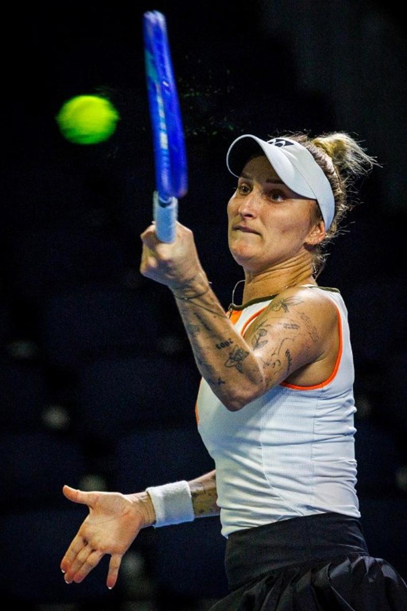 Czech Republic's Marketa Vondrousova hits a return against Poland's Magdalena Frech during the women's singles match at the Brisbane International tennis tournament in Brisbane on January 5, 2026. Patrick HAMILTON / AFP