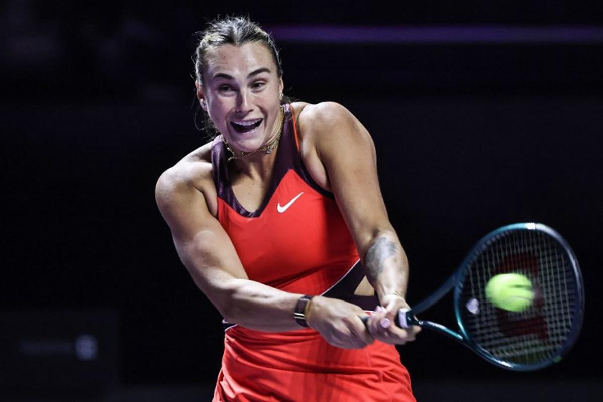 Belarus' Aryna Sabalenka hits a return against USA's Amanda Anisimova during their semi-final tennis match at the WTA Finals in Riyadh on November 7, 2025. Fayez NURELDINE / AFP