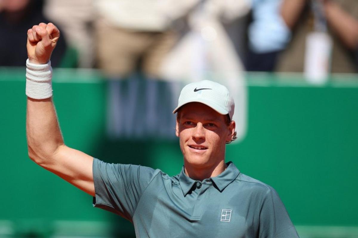 Italy's Jannik Sinner celebrates after winning over Czech Republic's Tomas Machac during their Monte Carlo ATP Masters Series Tournament round of 16 tennis match on Court Rainier III at the Monte-Carlo Country Club in Roquebrune-Cap-Martin, south-eastern France on April 9, 2026. Valery HACHE / AFP