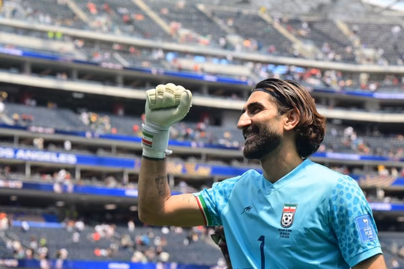 Iran's goalkeeper #01 Alireza Beiranvand celebrates at the end of the 2026 World Cup Group G football match between Belgium and Iran at the Los Angeles Stadium in Inglewood on June 21, 2026. Frederic J. Brown / AFP