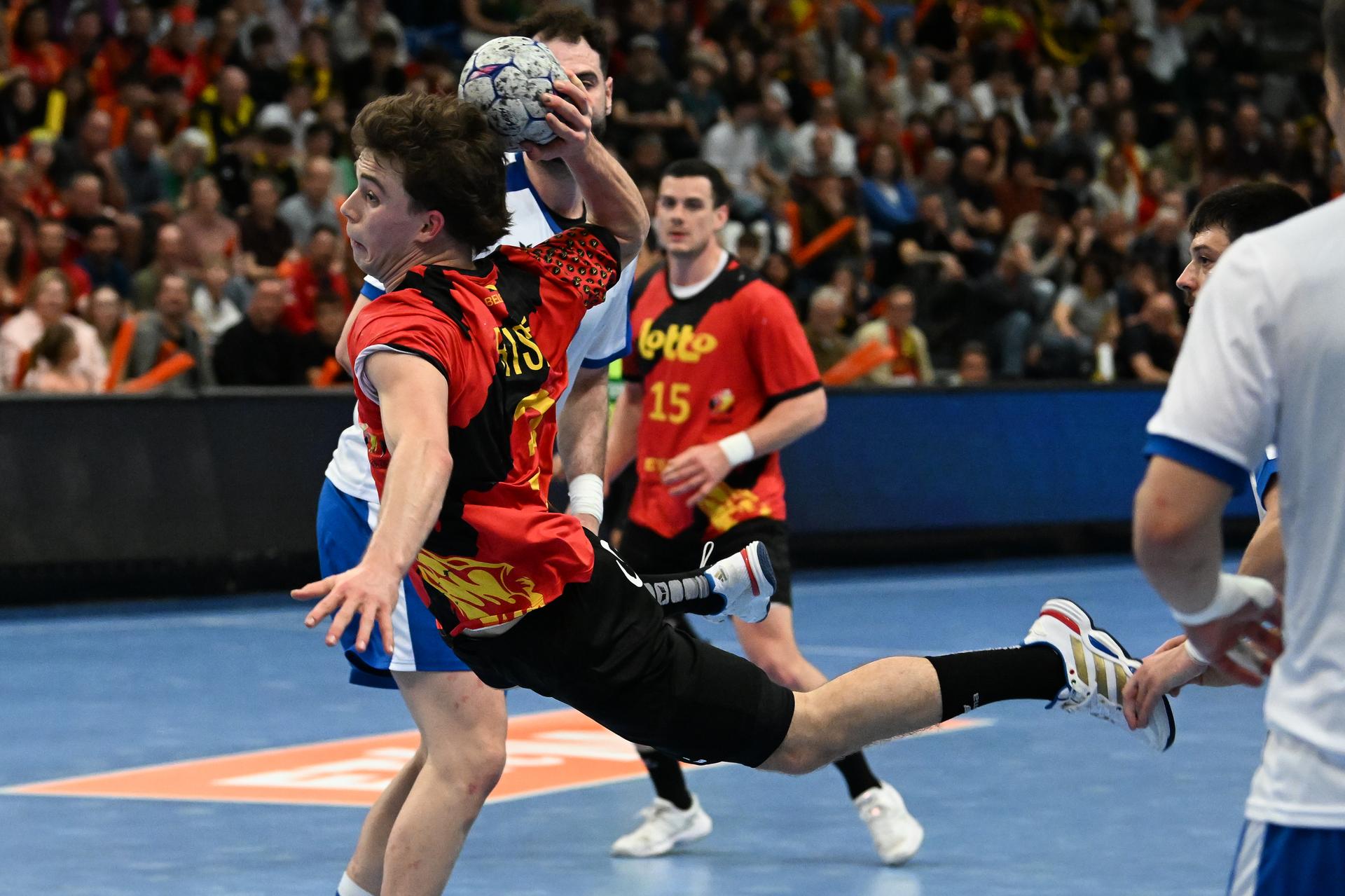 Belgium's Dree Riske and Greek Stefanos Michalidis pictured in action during a handball game between Belgian national team 'Red Wolves' and Greece, Saturday 21 March 2026 in Hasselt, fase 2 the qualifications for the men's 2027 World Championship. BELGA PHOTO JILL DELSAUX