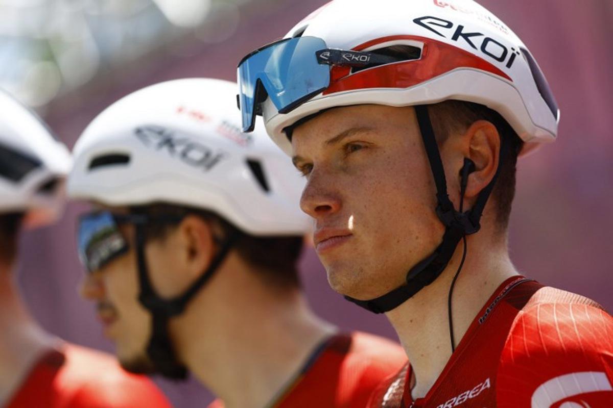 Lotto Intermarche Belgian rider Lennert Van Eetvelt looks on during the presentation prior the 4th stage of the Giro d'Italia 2026 - Tour of Italy cycling race between Catanzaro and Cosenza, Italy, on May 12, 2026. Luca Bettini / AFP