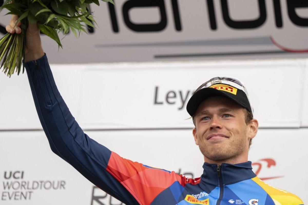 Lidl‑Trek's Swedish Jakob Soderqvist, awarded as best combative of the stage, celebrates during the podium ceremony of the final stage of the Tour of Romandie UCI cycling World tour, 178.2 km from Lucens and to Leysin, in Leysin, Switzerland, on May, 3, 2026. TIL BUERGY / AFP