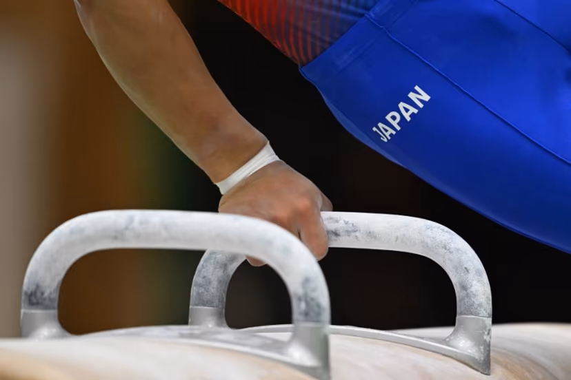 A gymnast practices the pommel horse during a Japan team training exhibition for the media ahead of the Aichi-Nagoya Asian Games in Tokyo on September 9, 2026. ANDREW CABALLERO-REYNOLDS / AFP