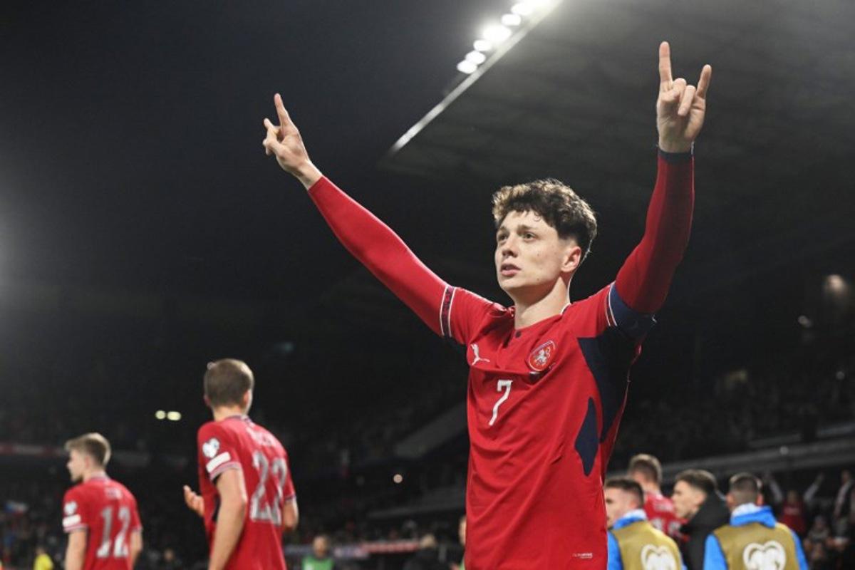 Czech Republic's defender #07 Ladislav Krejci celebrates after scoring the 2-1 goal during the first period of extra time during the FIFA World Cup 2026 European qualification final football match Czech Republic vs Denmark on March 31, 2026 in Prague, Czech Republic. Michal Cizek / AFP