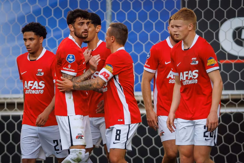 AZ's Kees Smit celebrates after scoring during a friendly soccer game between Belgian KAA Gent and Dutch AZ Alkmaar, on Wednesday 16 July 2025 in Gent. The teams are preparing for the upcoming 2025-2026 season. BELGA PHOTO KURT DESPLENTER