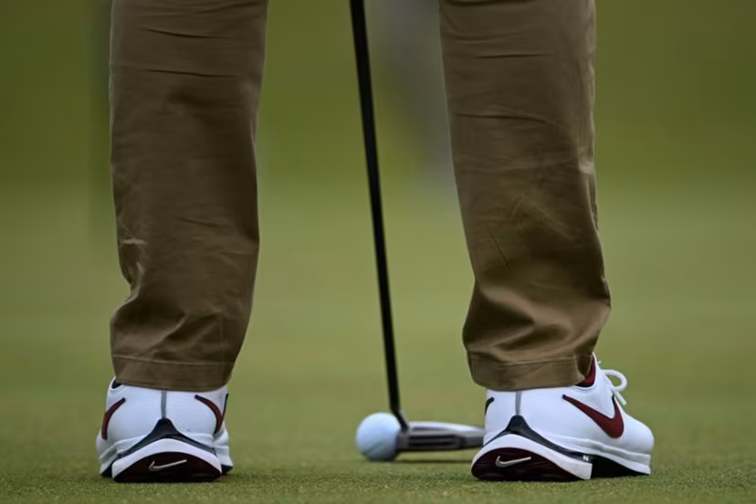 Northern Ireland's Rory McIlroy putts on the 12th green during a practice round ahead of the 152nd British Open Golf Championship at Royal Troon on the south west coast of Scotland on July 17, 2024. ANDY BUCHANAN / AFP