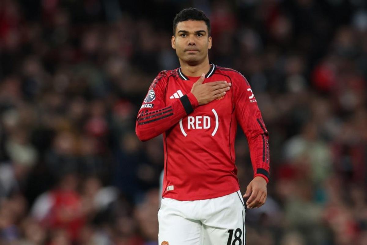 Manchester United's Brazilian midfielder #18 Casemiro celebrates after scoring the opening goal during the English Premier League football match between Manchester United and Brentford at Old Trafford in Manchester, north west England, on April 27, 2026. Darren Staples / AFP
