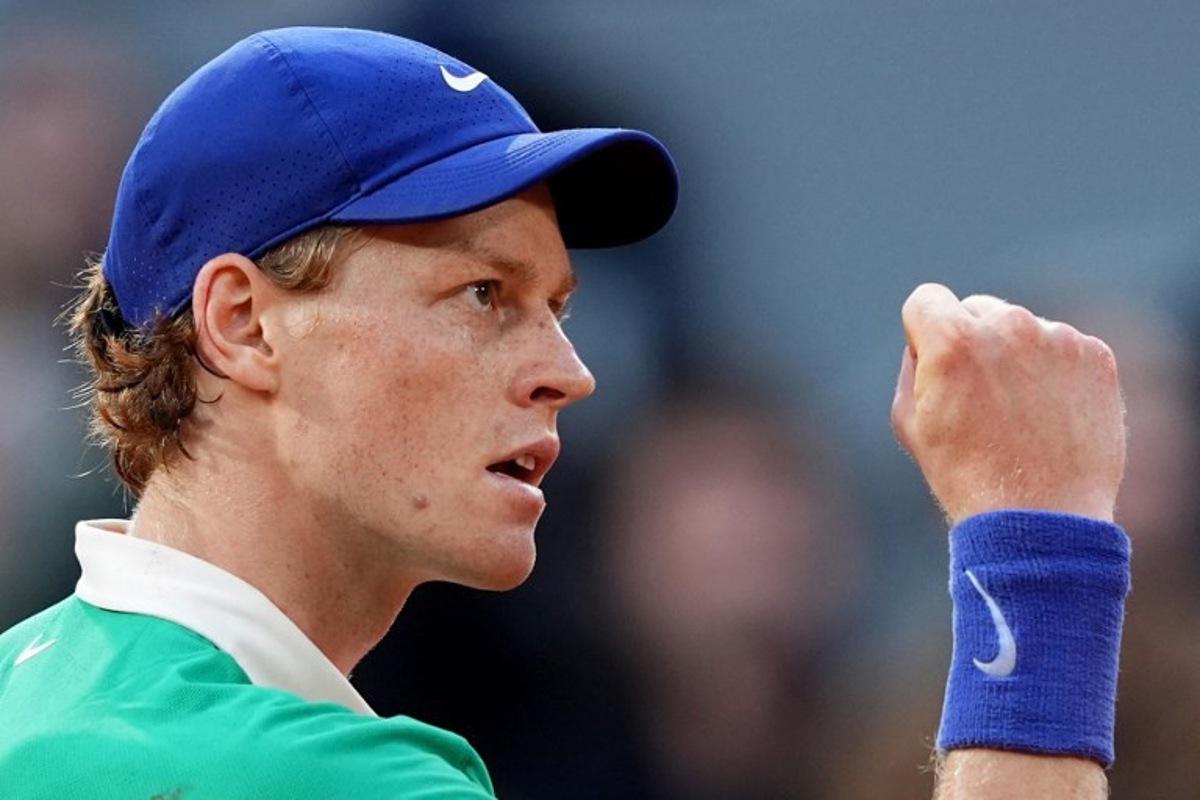 Italy's Jannik Sinner reacts after a point during his men's singles semi-final match against Serbia's Novak Djokovic on day 13 of the French Open tennis tournament on Court Philippe-Chatrier at the Roland-Garros Complex in Paris on June 6, 2025. Dimitar DILKOFF / AFP