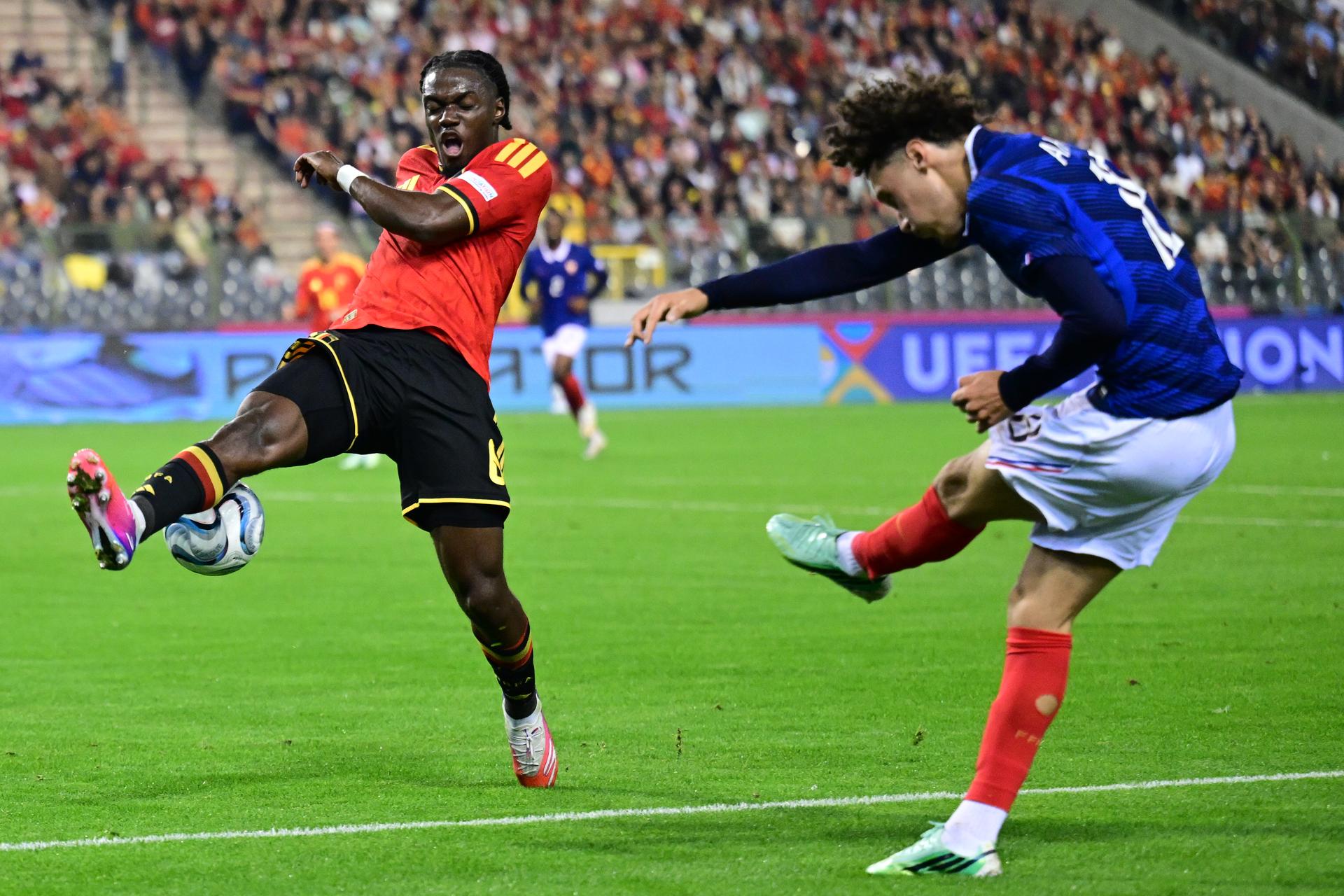 Belgium's Romeo Lavia and France's Maghnes Akliouche pictured during a soccer game between Belgian national team Red Devils and France, on Monday 28 September 2026 in Brussels, the second game of the UEFA Nations League group stage. BELGA PHOTO DIRK WAEM