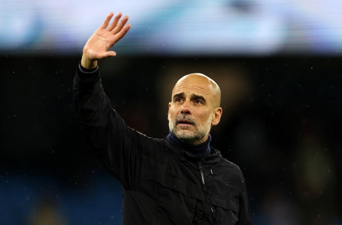 Manchester City's Spanish manager Pep Guardiola waves to the fans following the English Premier League football match between Manchester City and Crystal Palace at the Etihad Stadium in Manchester, north west England, on May 13, 2026. Darren Staples / AFP