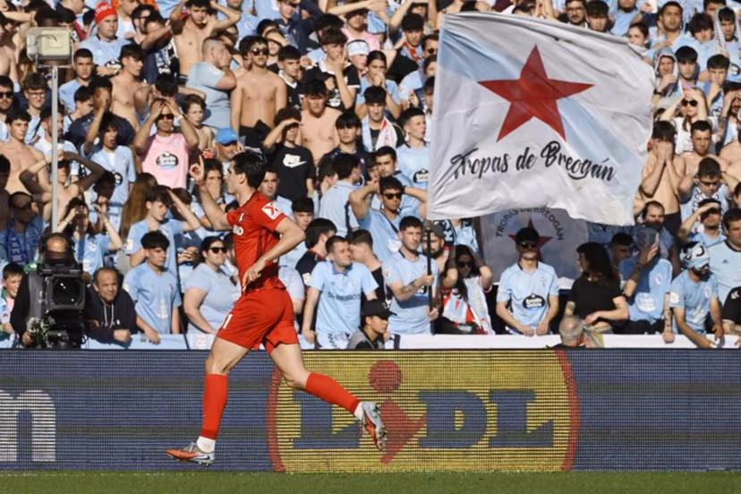 Freiburg's German forward #31 Igor Matanovic celebrates scoring the opening goal during the UEFA Europa League quarter final second leg football match between RC Celta de Vigo and SC Freiburg at Balaidos Stadium in Vigo on April 16, 2026. Miguel RIOPA / AFP