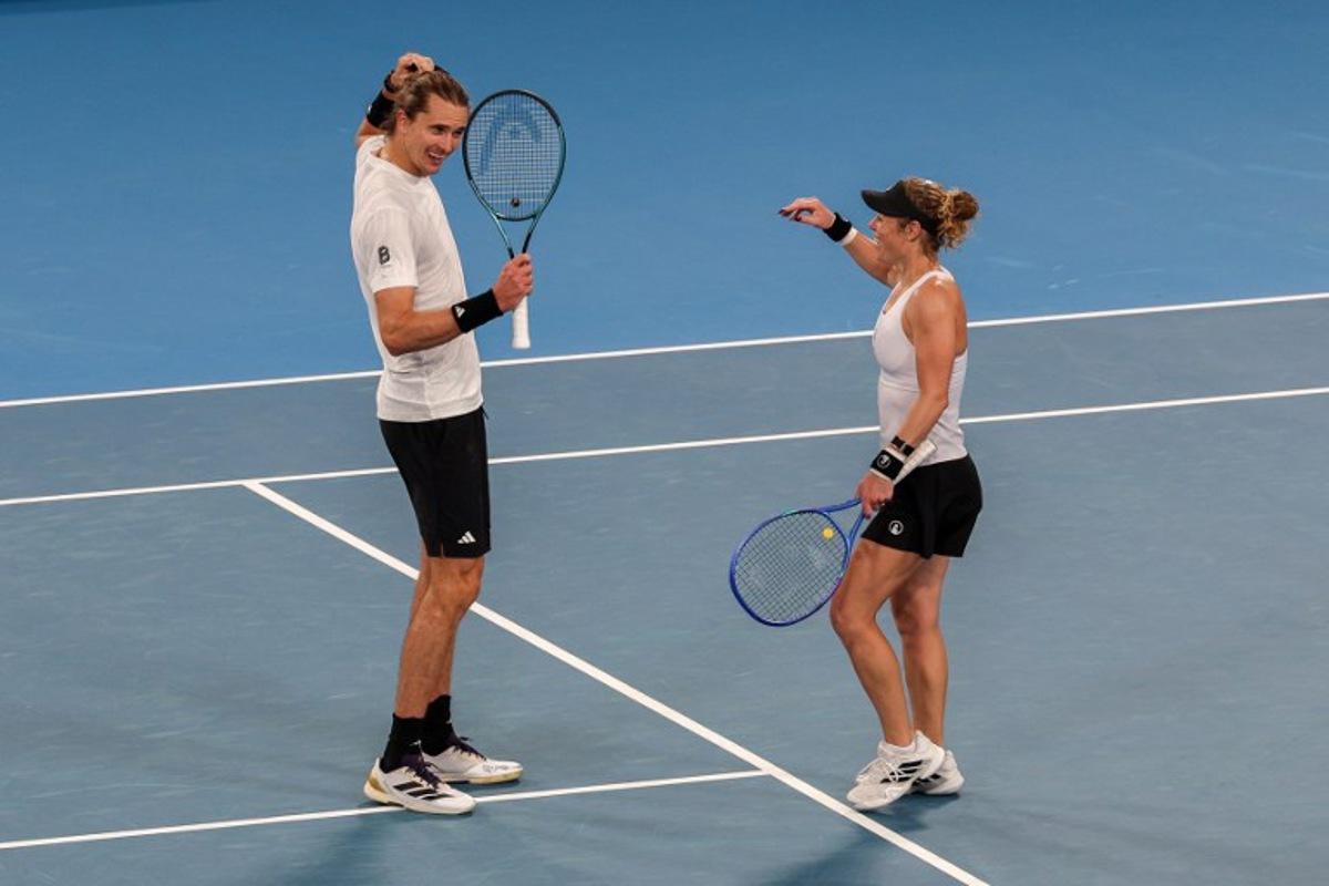 Germany's Alexander Zverev and Laura Siegemund celebrate after victory against Netherlands' Tallon Griekspoor and Demi Schuurs during their doubles match at the United Cup tennis tournament in Sydney on January 4, 2026. Izhar KHAN / AFP